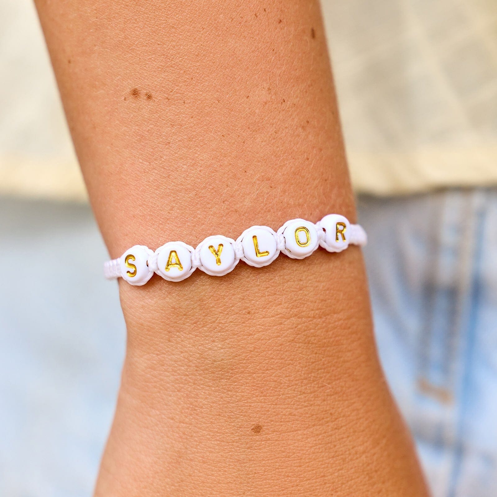 White Alphabet Bead Bracelet - Image 2